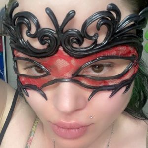 Art with latex red lace mask